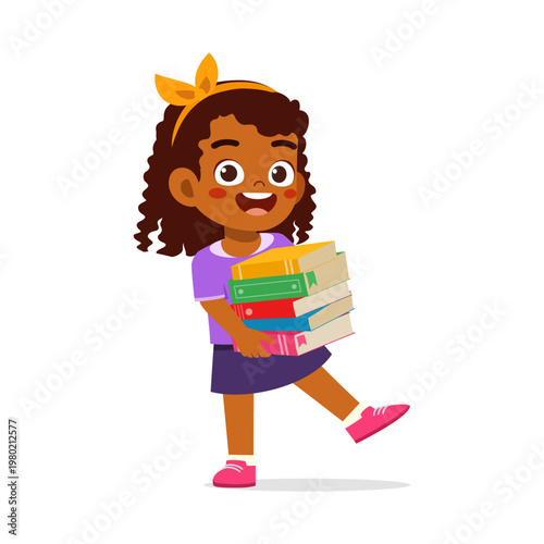 Happy dark skinned little girl carrying a stack of colorful books with a joyful smile and curly hair walking