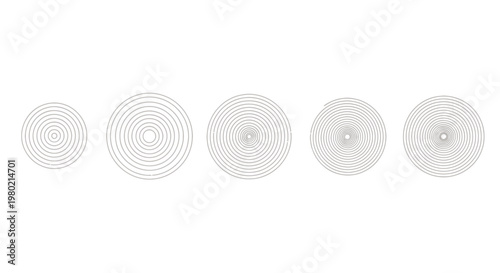 Abstract row of circular pattern discs with concentric dot designs in grayscale.