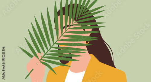 A woman partially obscured by large vibrant green palm leaves creating a natural artistic portrait