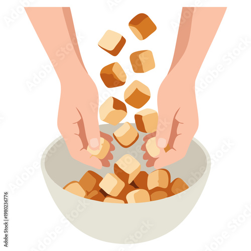 Hands dropping croutons into a bowl.
