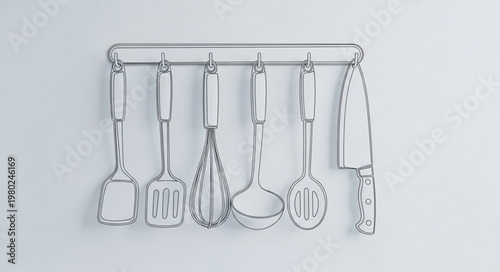 Stainless Steel Kitchen Utensils Hanging On Rail.