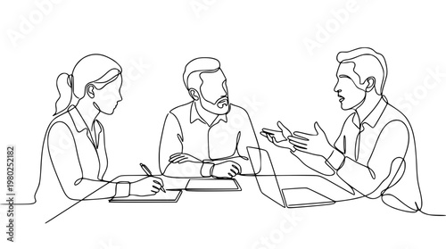 Business team discussing strategy with laptop and documents present