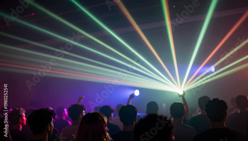 Crowd at Nightclub Party Under Colorful Laser Lights and Smoke