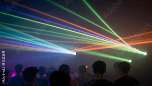 Crowd at Nightclub Party Under Colorful Laser Lights and Smoke