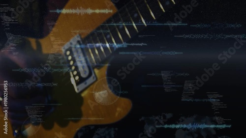 Guitarist playing amber guitar in studio, fretting and picking near pickup while HUD driving signal