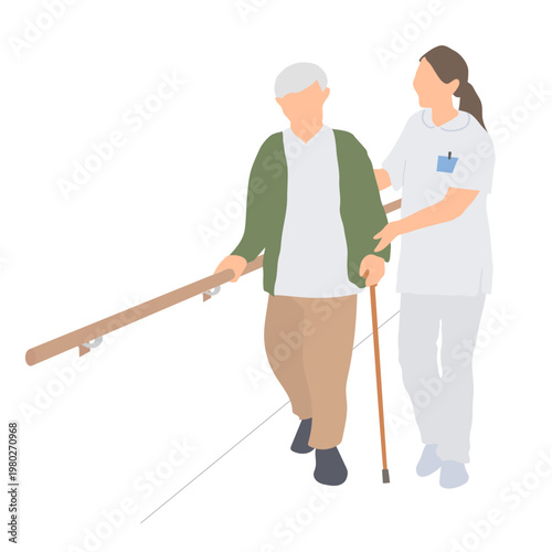 手すりと杖を使って歩く高齢男性を支える介護スタッフ
