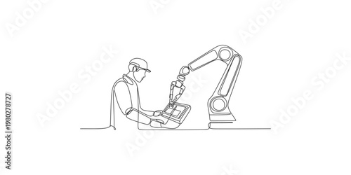 Man working with robotic arm and control panel in a factory setting robotics industrial automation