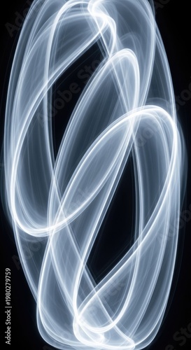 Abstract Light Trails Against Black Background.