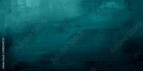 Dark vintage blue abstract background with a grungy textured concrete wall pattern and aged paint on a rough paper surface