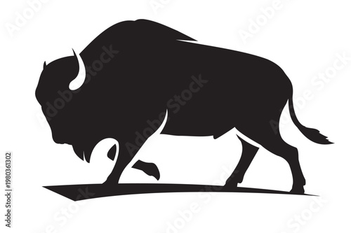 Black silhouette of a bison walking isolated on white background