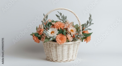 White basket filled with synthetic flowers against plain background