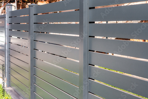 Modern fence with aluminum or metal shutter
