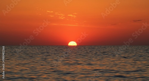 Sunset sky with sun glowing...