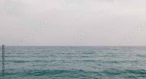 still ocean waves beneath a...