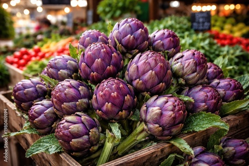 Fresh purple artichokes bursting with vibrancy at a colorful farmers market stall