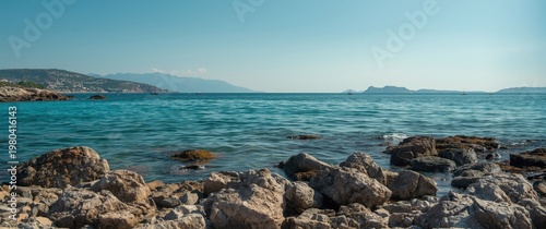 Rocky bay shores beside ser...