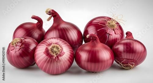 Fresh Whole Red Onions Grouped on a Clean White Background, Ready for Healthy Cooking and Culinary Use