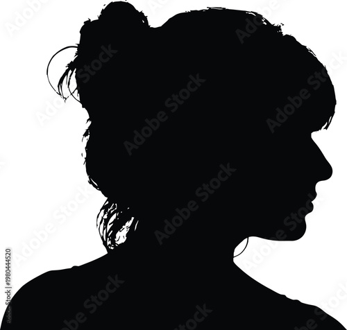 Black silhouette of a woman's head with hair bun profile