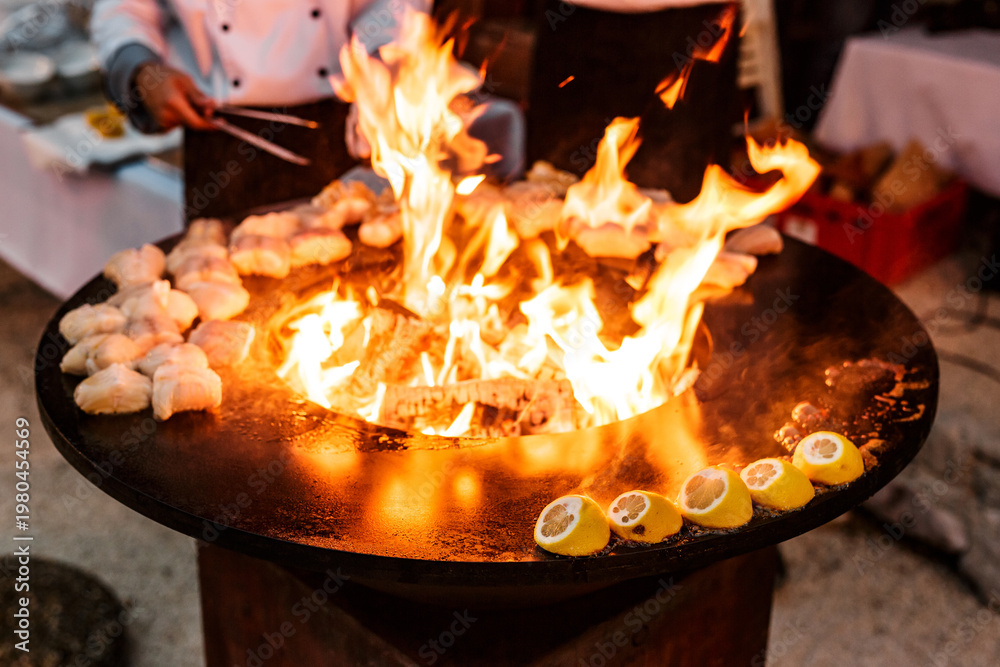 Фотография Chef ignites seafood with flair
