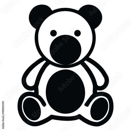 Black and white teddy bear sitting alone on white background
