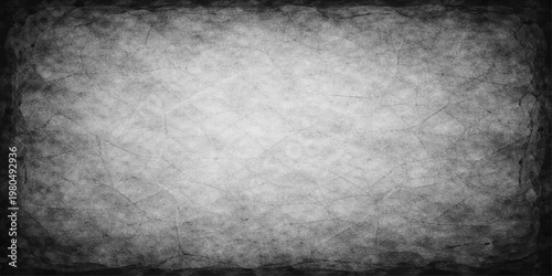 A dark aged metal and concrete wall texture with a rough vintage grunge effect creates a dirty gray stone surface pattern for an old industrial backdrop