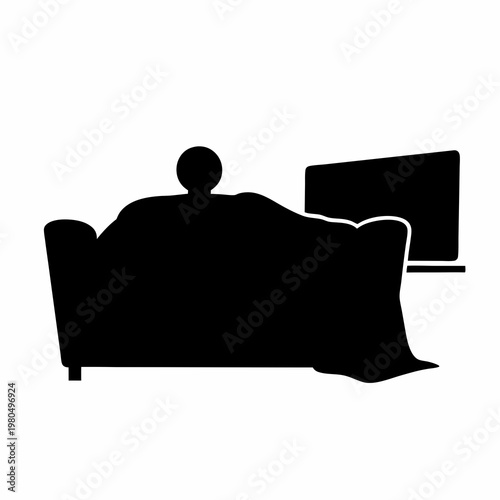 Silhouetted figure reclining on a sofa, watching television in their living room