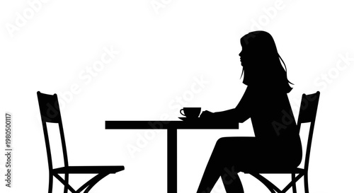 Woman sitting at table alone.