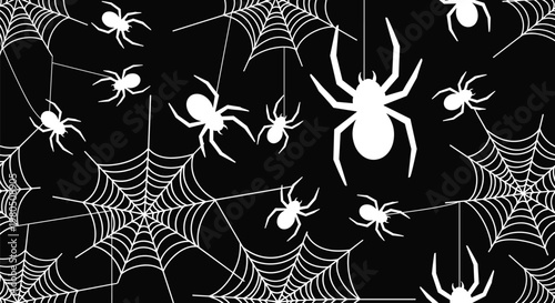 Scary halloween seamless pattern with white spiders and thick spider webs on a black background for a spooky vibe.