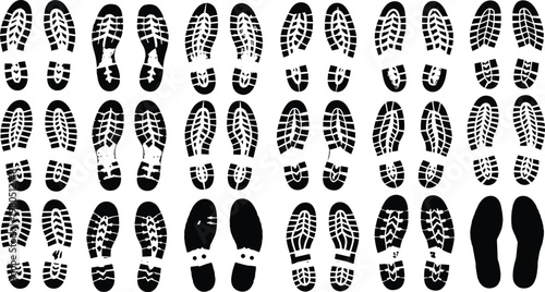 Quadro su tela Shoe footprints silhouettes vector set