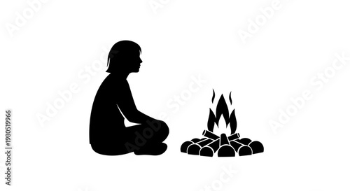 Man sitting by camp fire.