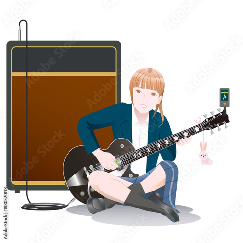 ギターのチューニングをする女子高生