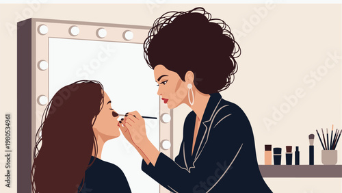 Talented makeup artist applies cosmetics to a female client face in front of a vanity mirror with professional studio lighting.