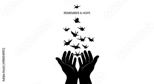 Black silhouette of hands releasing a flock of origami paper cranes.