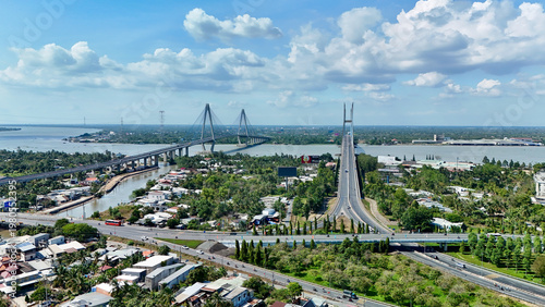 Schilderij op canvas Mekong River (Tien), Vietnam – 4K aerial drone view of My Thuan Bridge, cable-st