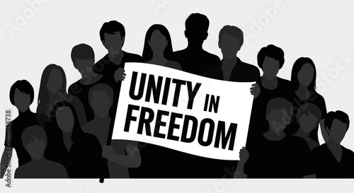 Silhouette of a diverse group of people holding a banner with Unity in Freedom message.