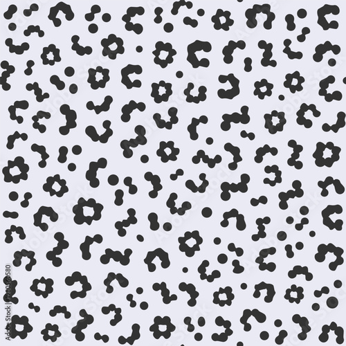 Stylized animal print background with natural spots, ideal for fashion textile