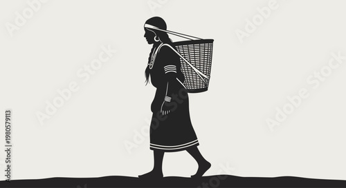 Silhouette of an indigenous woman carrying a traditional woven basket on her back.