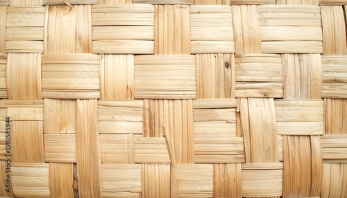 A woven texture of light brown wooden strips