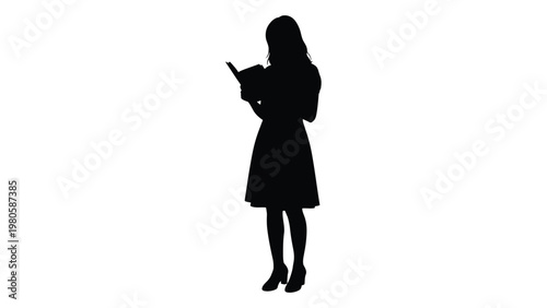 Silhouette of a woman reading a book standing against a bright white backdrop creating a stark contrast