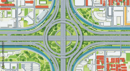 Aerial view of a complex highway interchange with surrounding urban development and greenery