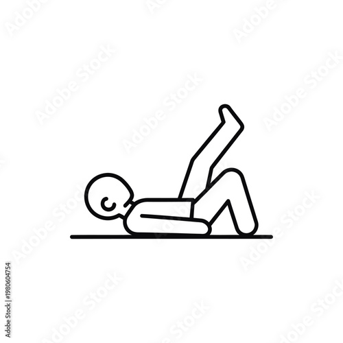 A person engaging in a core exercise on the floor for fitness and wellness
