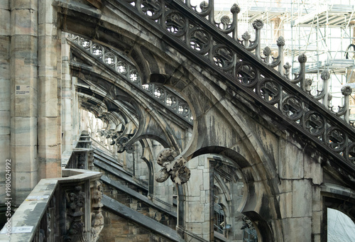 Obraz na płótnie Visiting rooftop terrace of Duomo di Milano cathedral with panoramic views over Milan Italy