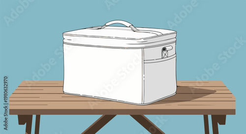 White insulated cooler bag on wooden picnic table