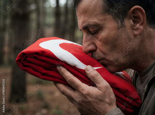 An emotional portrayal of patriotism, loss, and remembrance expressed through a symbolic connection with the Turkish flag