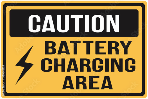 Yellow and black warning sign: Caution. Battery charging area.