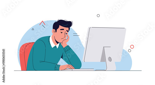 Young man feeling bored and tired while sitting at a desk and looking at a computer screen in a simple office environment.