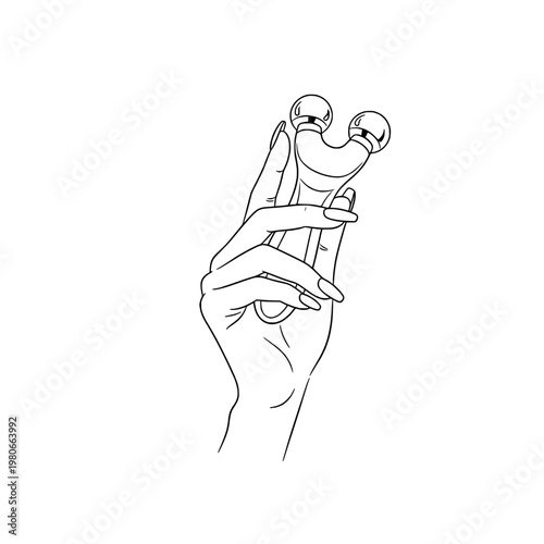 Icon of a beautiful female hand holding a facial massager, representing concepts of skincare and beauty routine