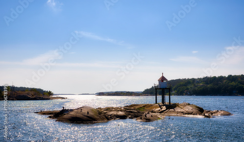Gravningsund Lighthouse on Kuskjaer Reef in Gravningsund between Nordre Sandoy and Sondre Sandoy in Hvaler, Norway