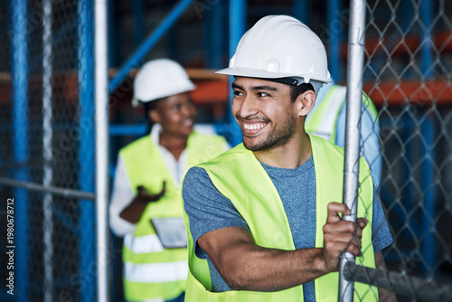 Photos Preparation, smile or man on construction site with gate, shift setup or activation in morning