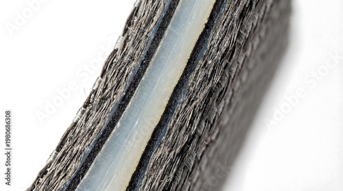 Cross section of carbon fiber composite material showing layers